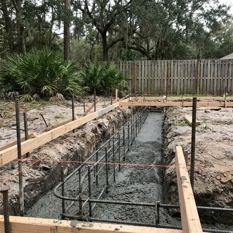 Footings & Deck Piers poured with metered small-load concrete in Florida