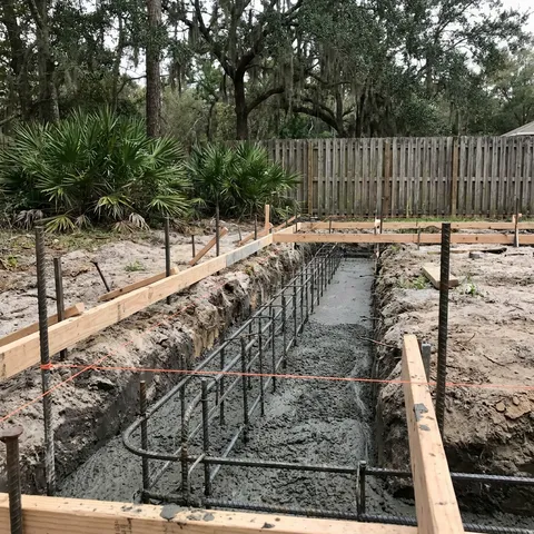 Footings & Deck Piers poured with metered small-load concrete in Florida